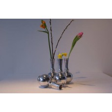 A beautiful polished aluminum Ball vase